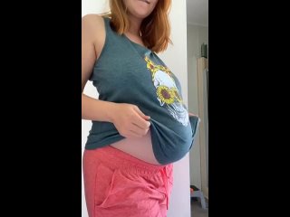 pregnant woman showing boobs